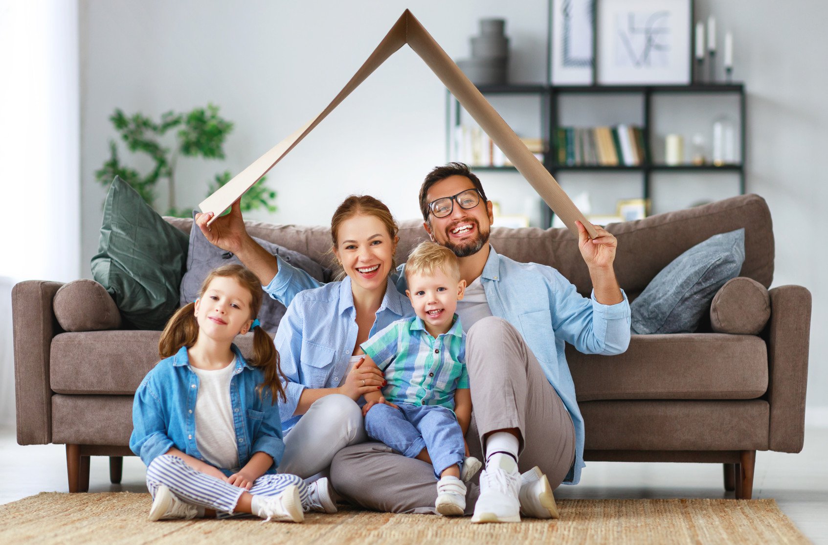 Family Smiling in Living Room.